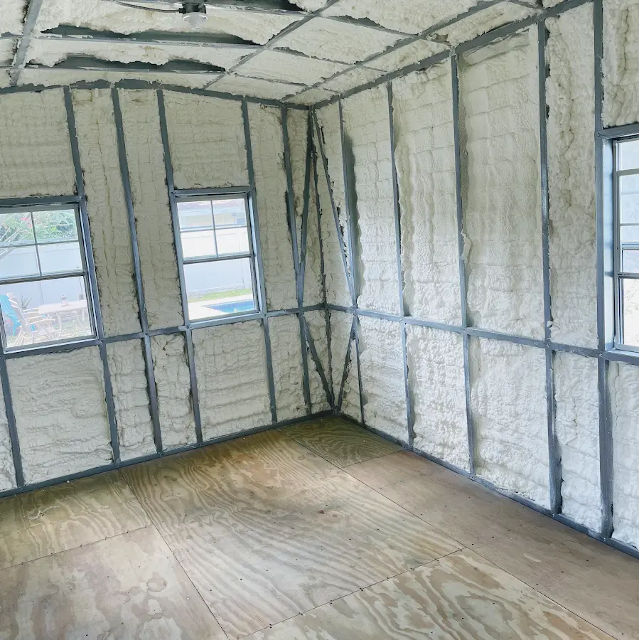 Closed-cell spray foam insulation applied to wall cavities in a residential project in Bound Brook